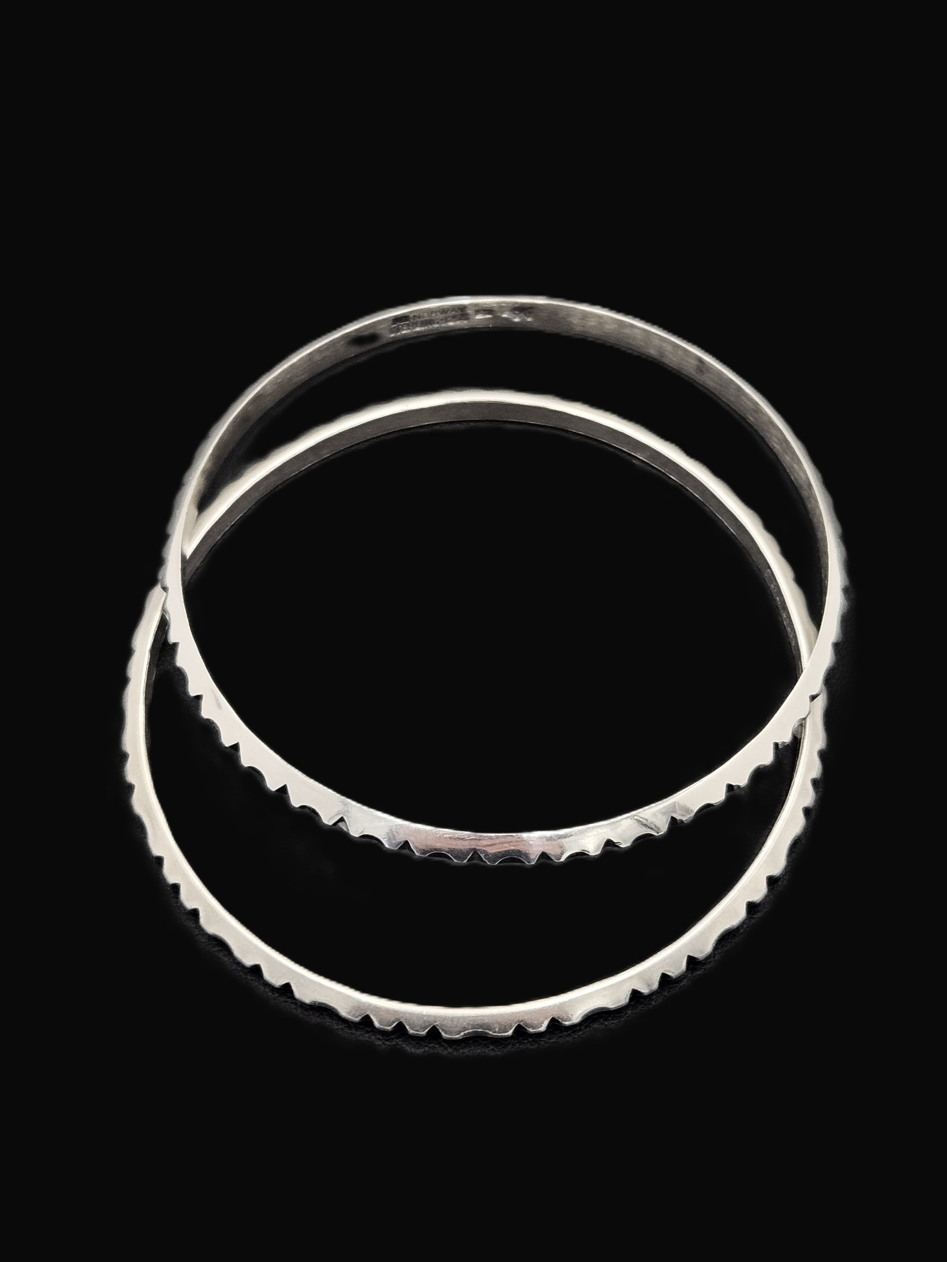 Norway+ Designs Erling Christoffersen Rare Set/2 Sterling Ridged Bangles 1960s, silver, black, sterling silver - image 1 of 6
