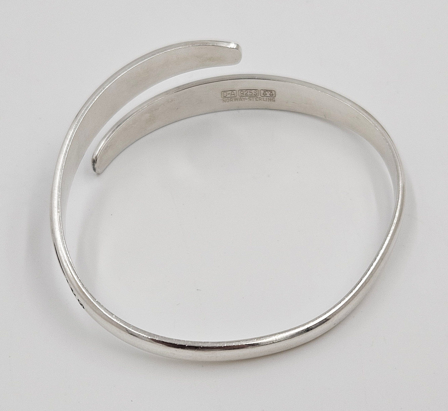 David Andersen Jewelry David Andersen Norway Sterling Viking Saga Series Bi-Pass Bangle Circa 1960's